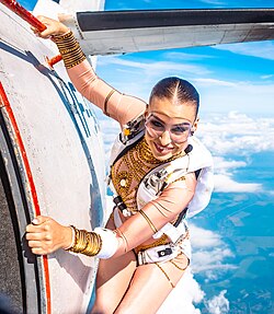 Skydiver_Holding_Aircraft_Door_Before_Exit.jpg